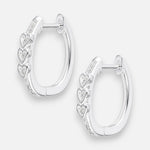 Argolla Huggie Ovalada Corazones Circones 16x14 mm