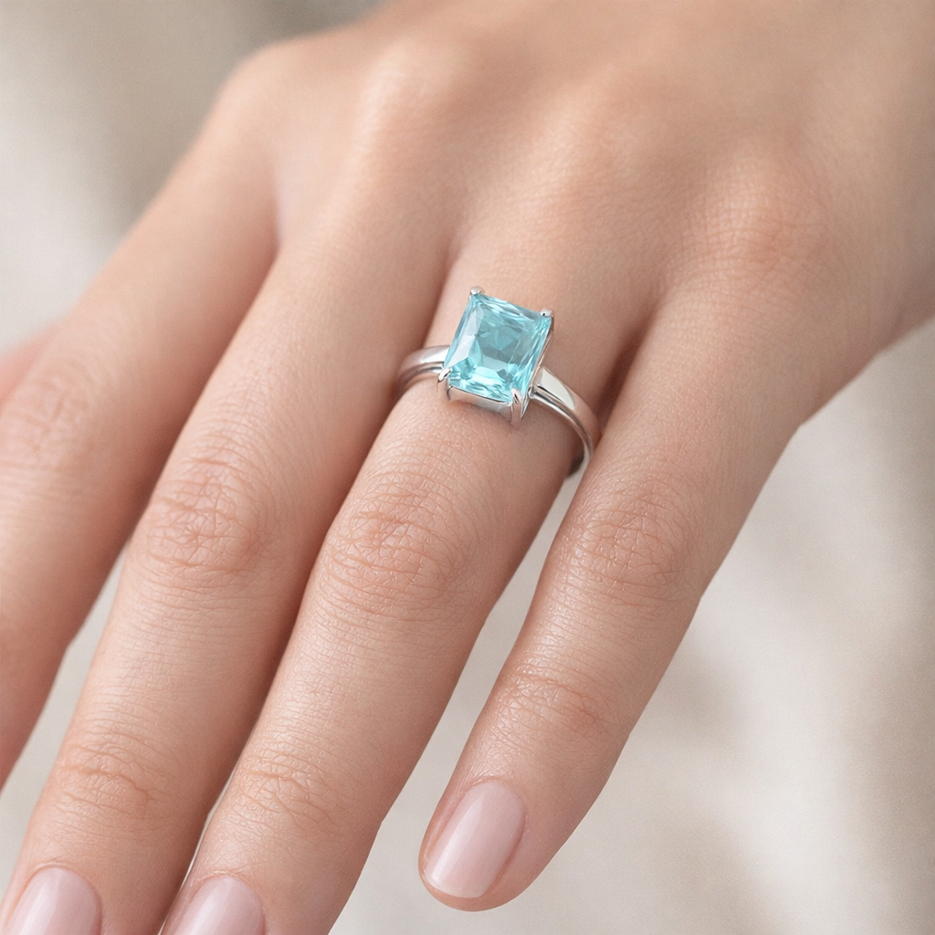Anillo solitario Circón Baguette Agua Marina