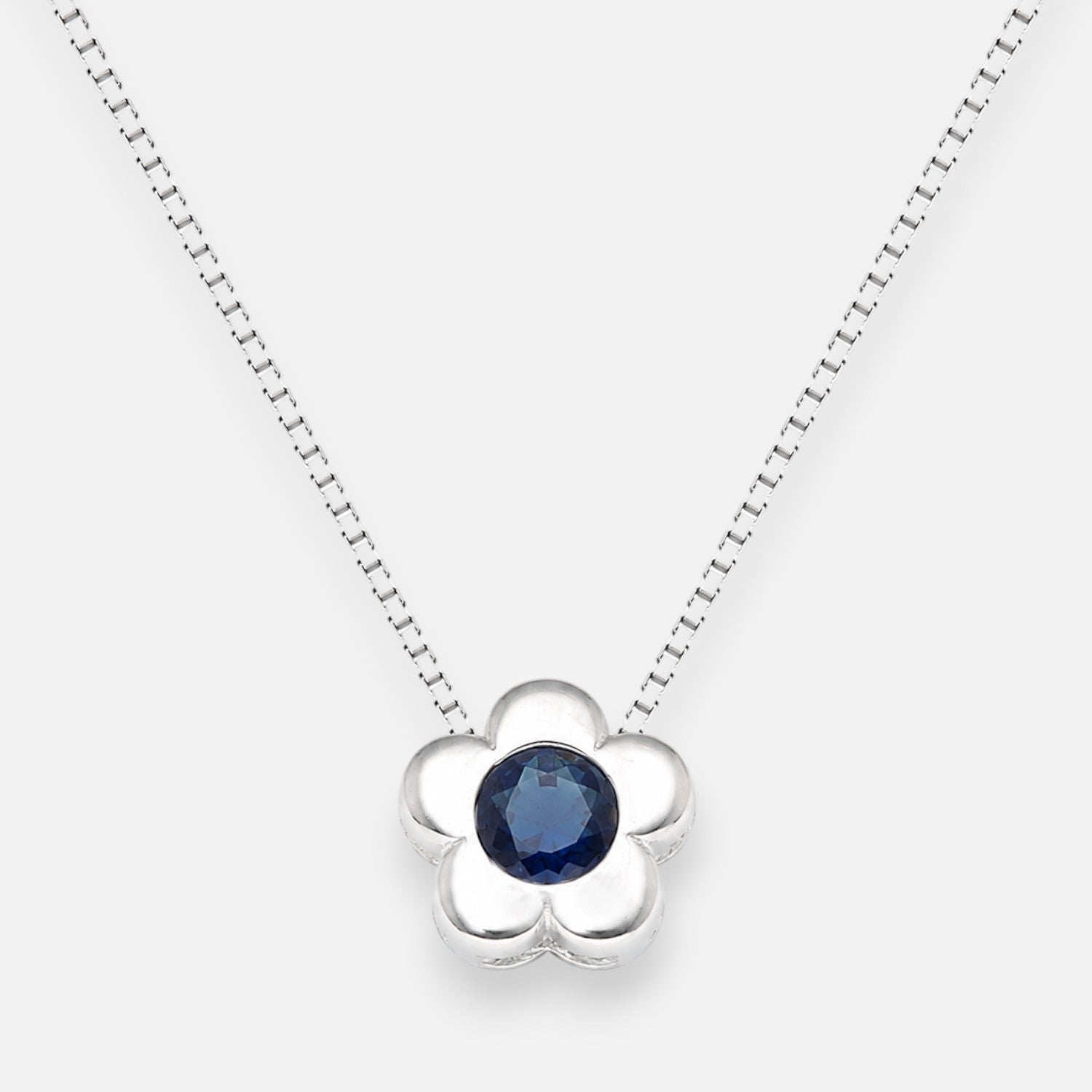 Collar Flor Circón punto de Luz Zafiro 4 mm