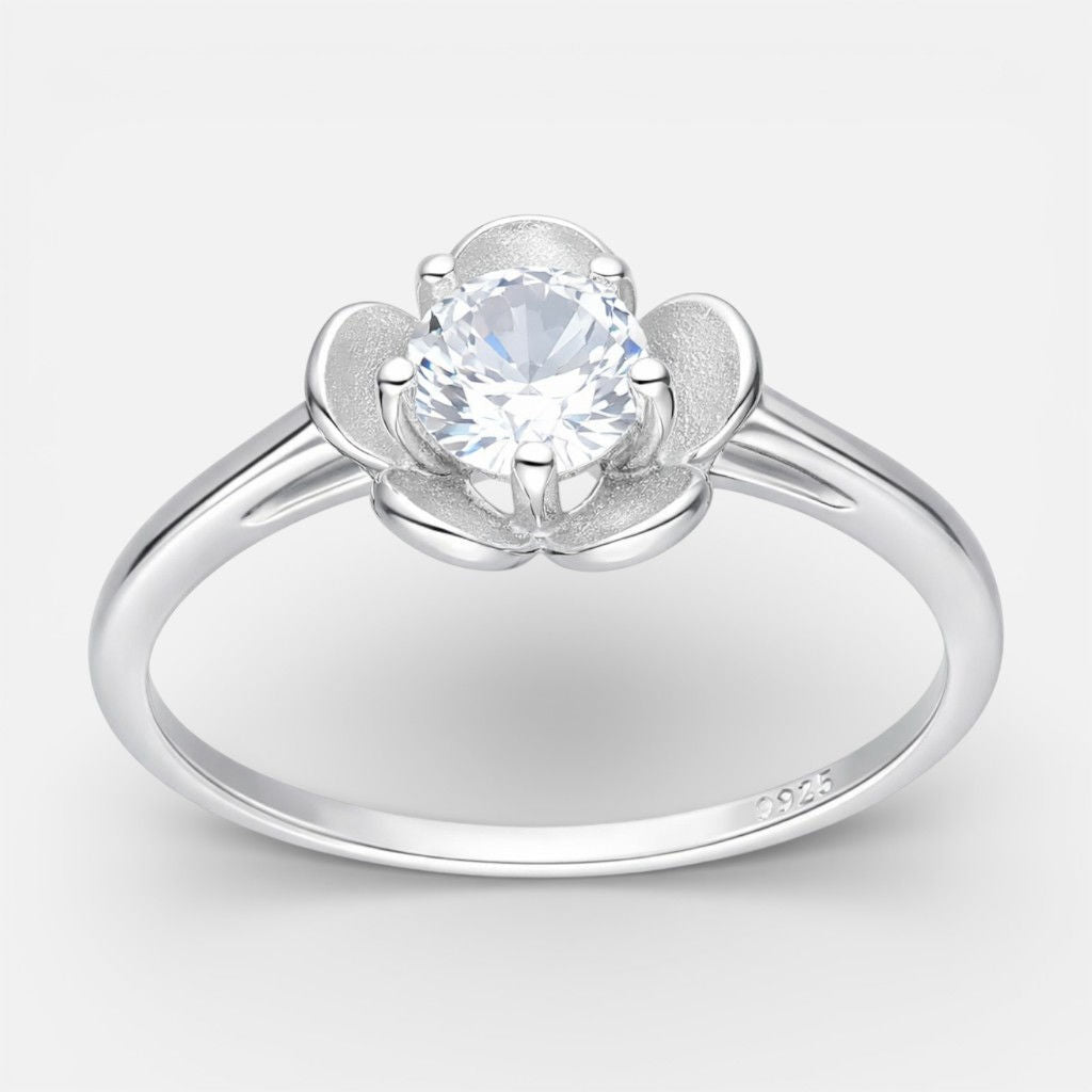 anillo flor circon