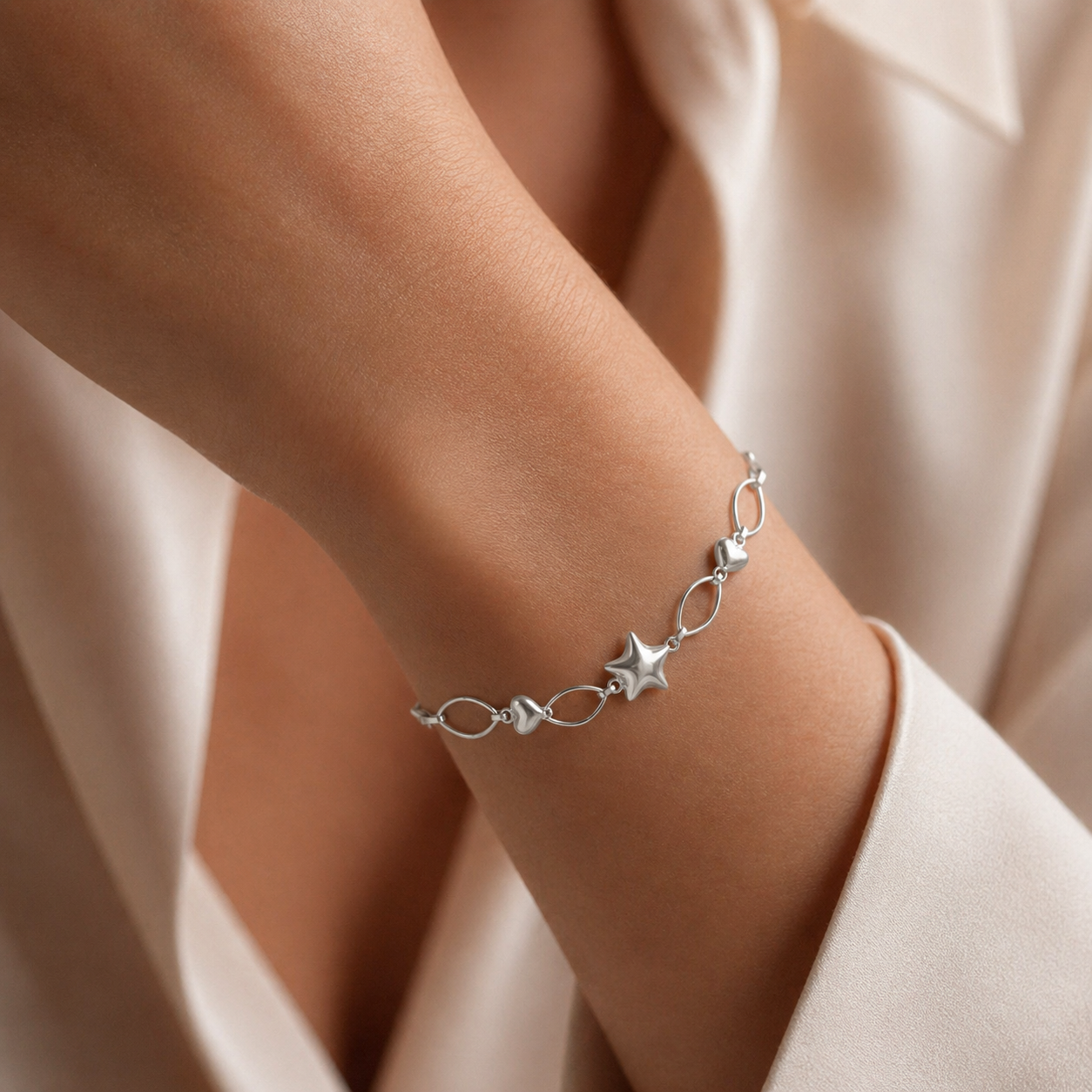 Pulsera Estrella Óvalos Corazones