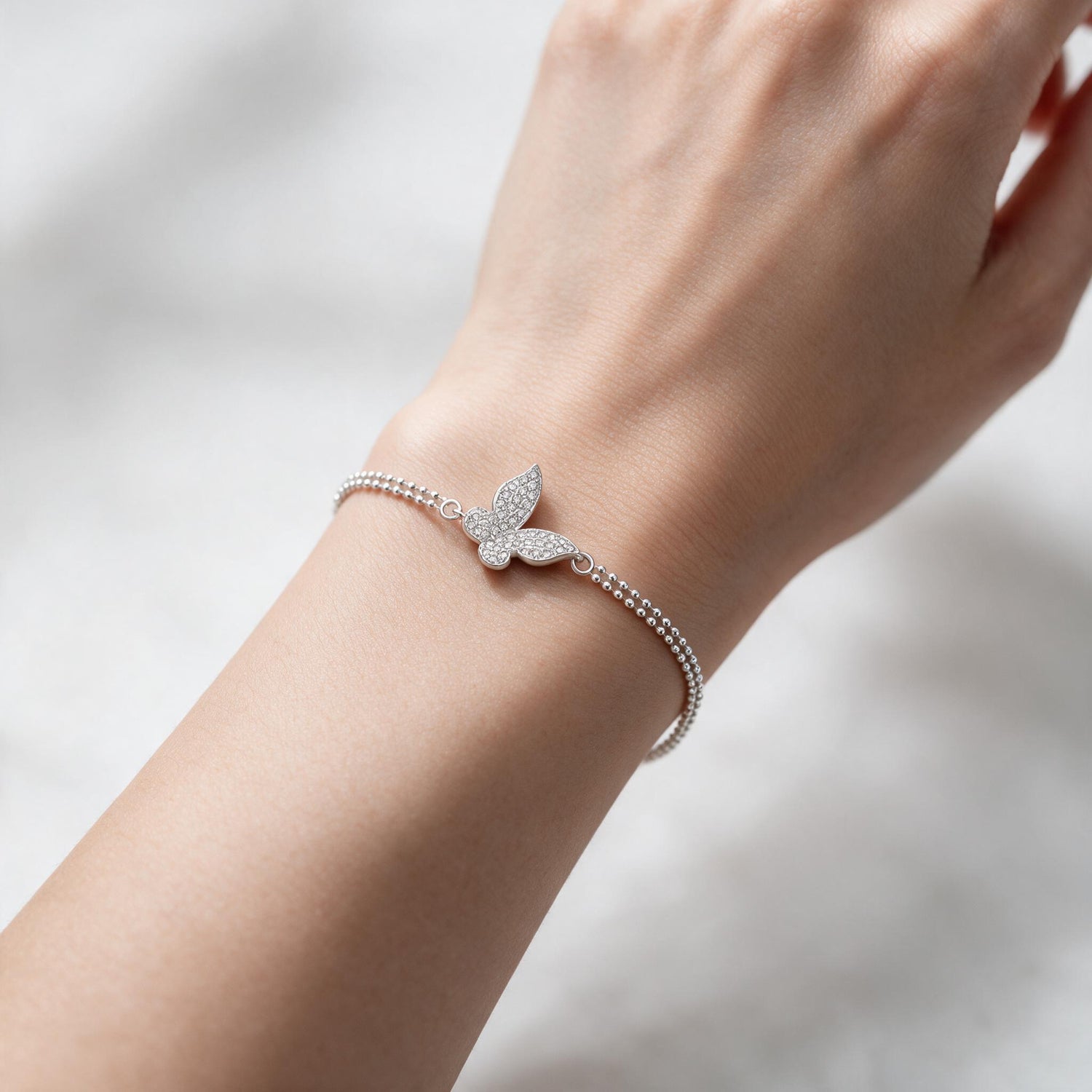 Pulsera Malla Esferas Mariposa Circones