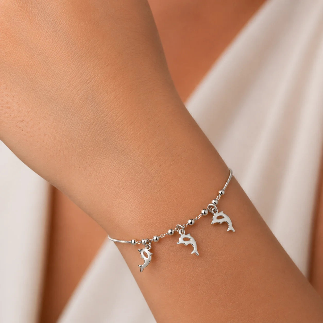 Pulsera Esferas Delfines