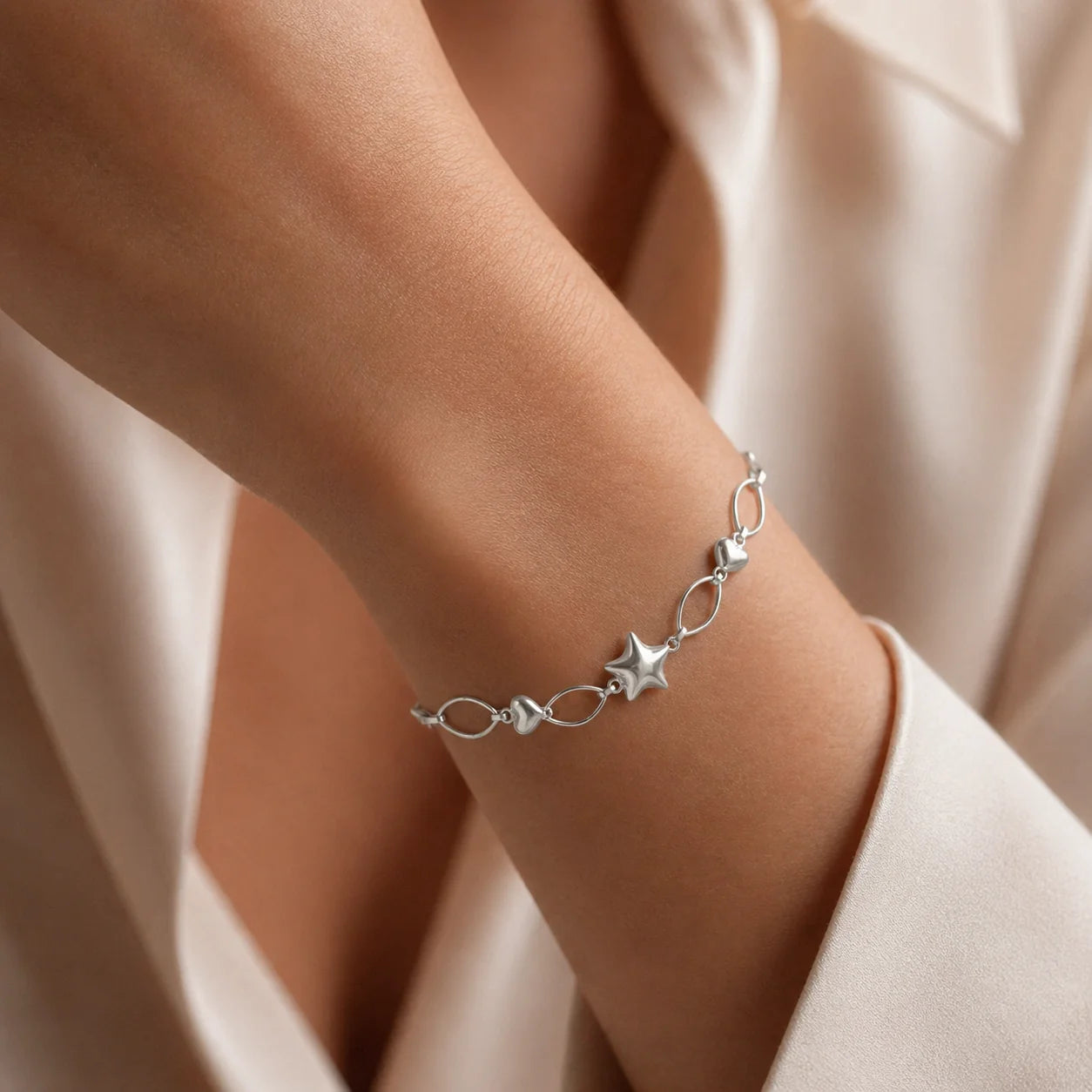 Pulsera Estrella Óvalos Corazones